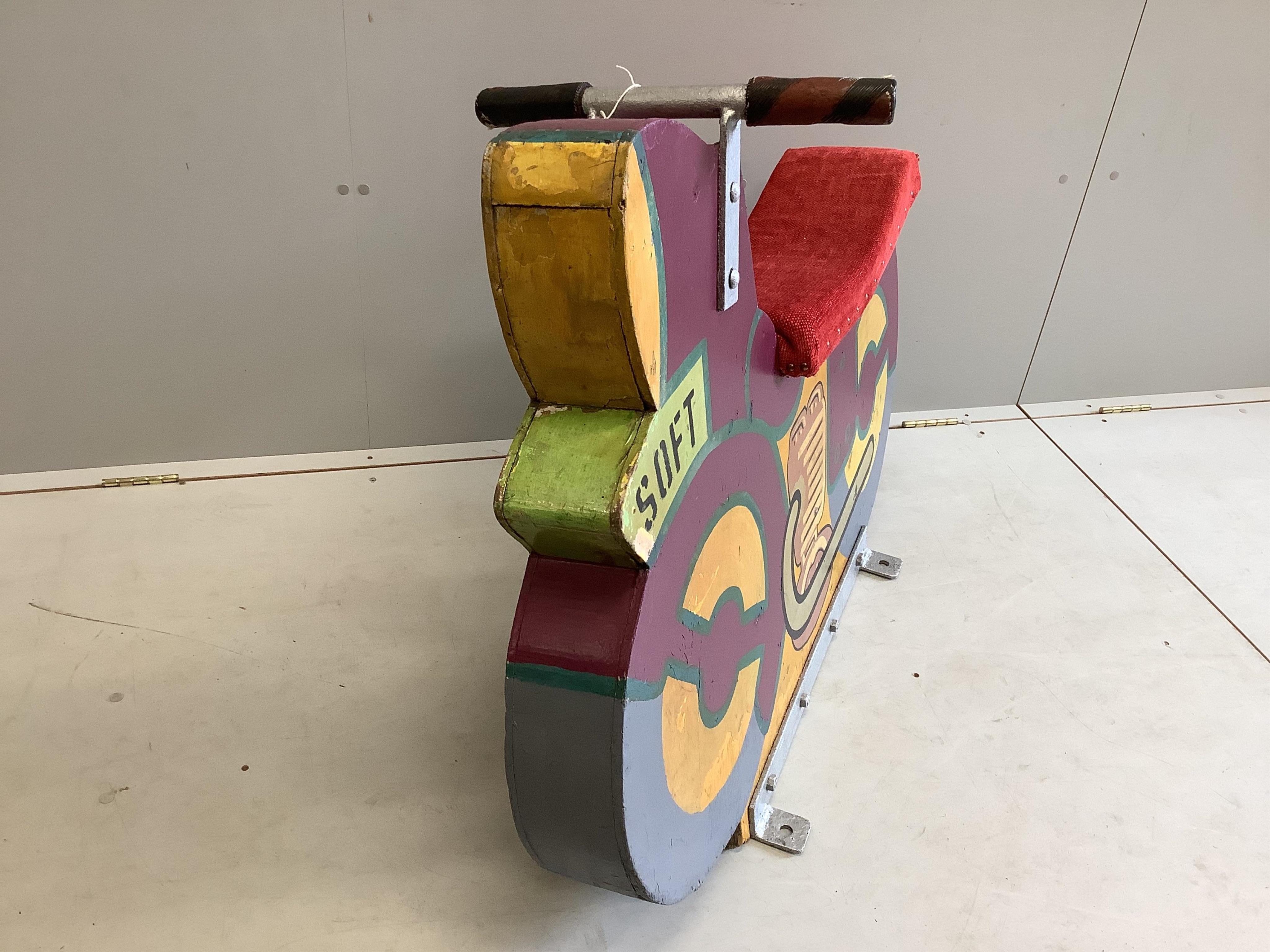 A mid 20th century carved painted wood fairground 